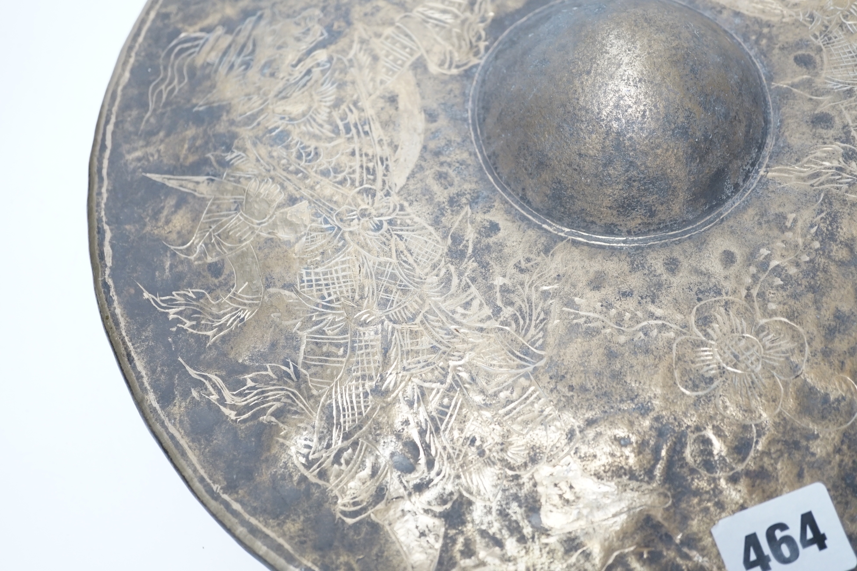 An Indonesian silver plated gong and beater, gong 33cm diameter